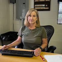 Volunteer Dorothy S., receptionist at Carbon Valley Help Center.